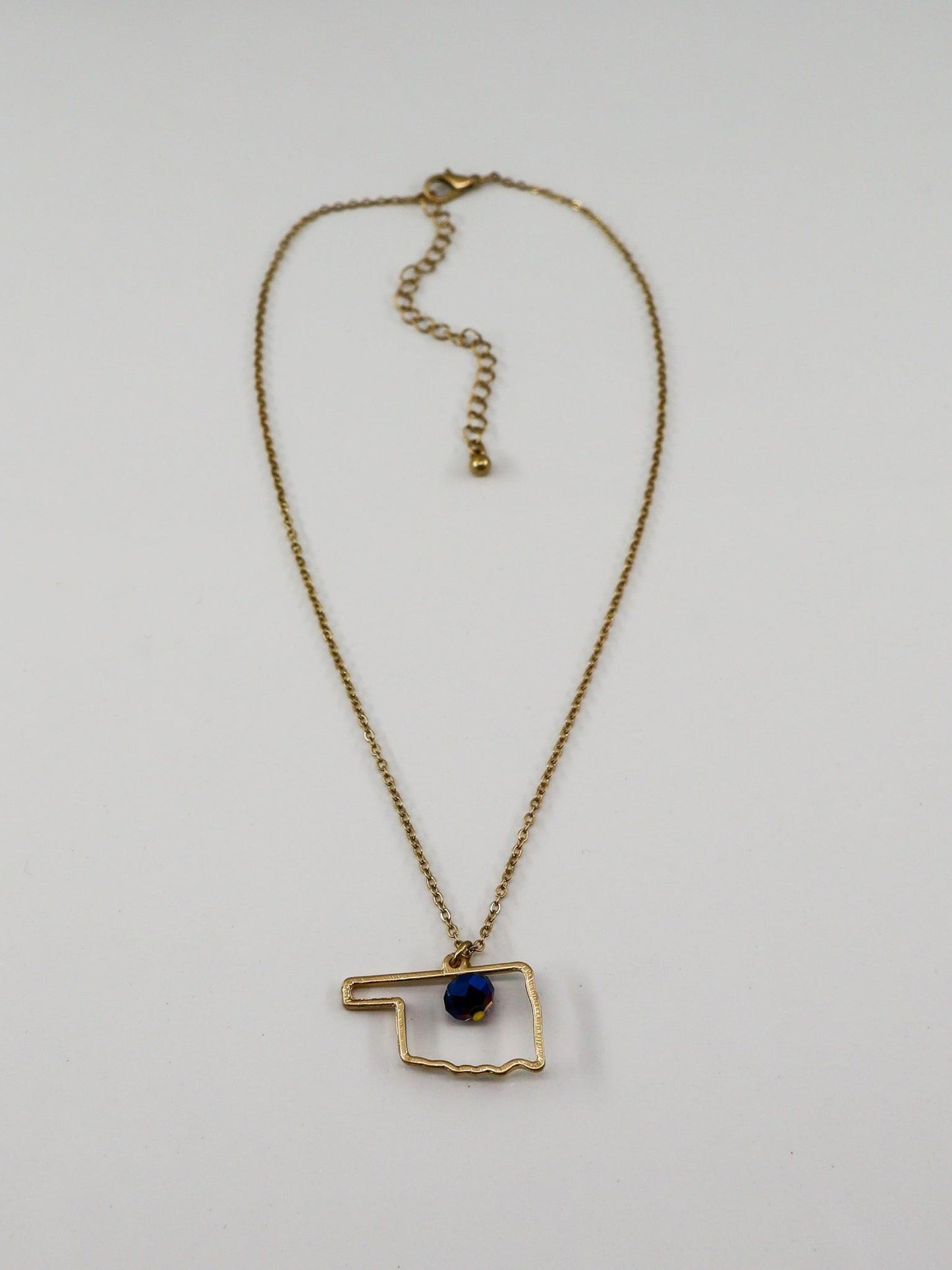 Gold Oklahoma Outline Necklace - Blue Crystal